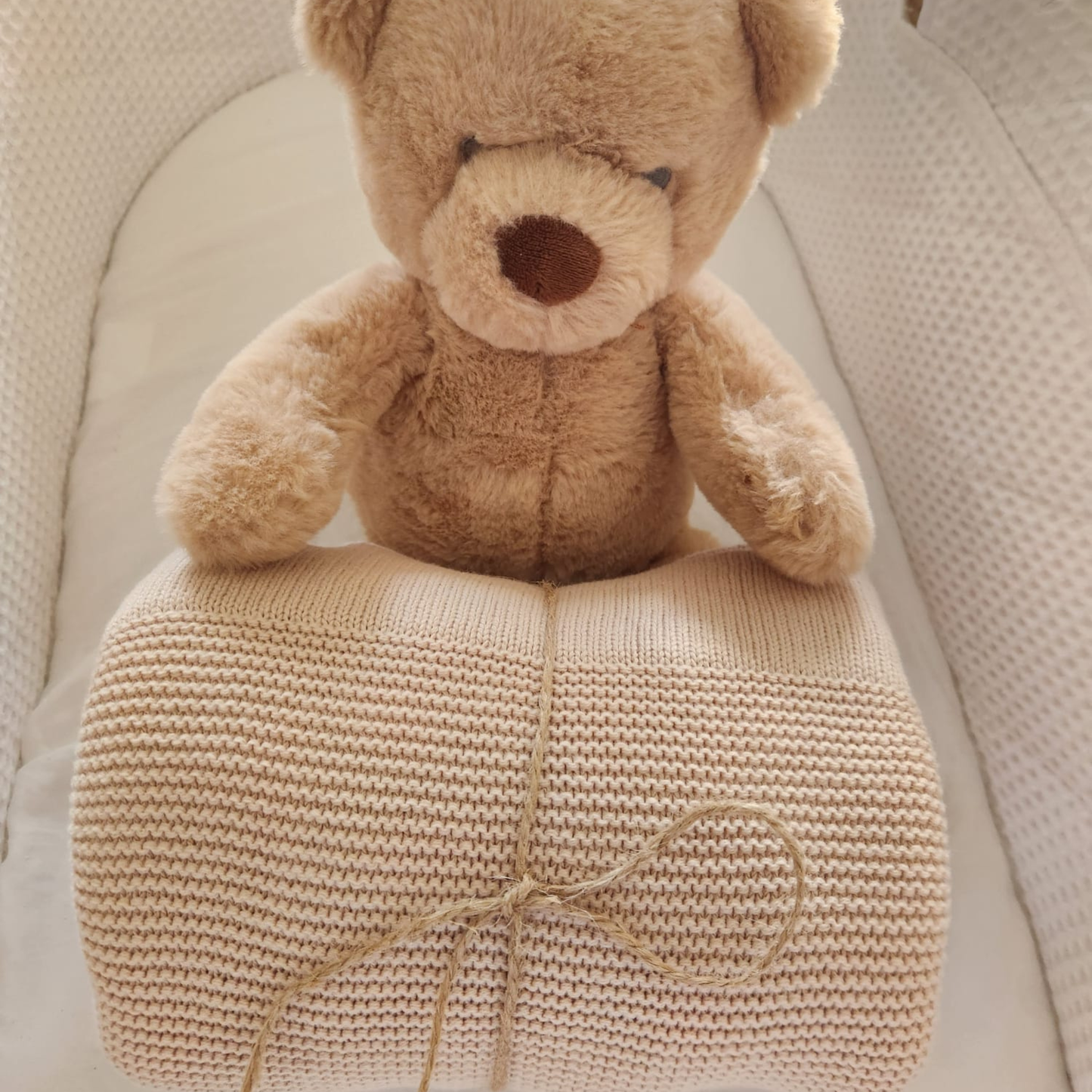 Beige knit baby blanket