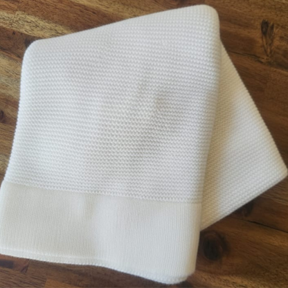 White knit baby blanket